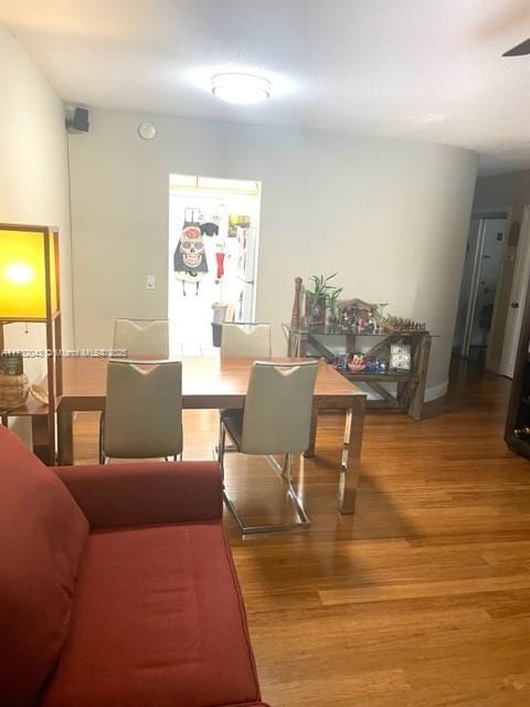 dining area featuring wood-type flooring