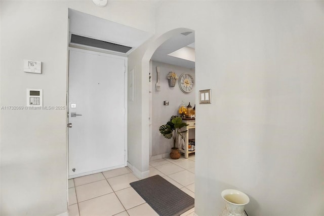 view of tiled foyer entrance