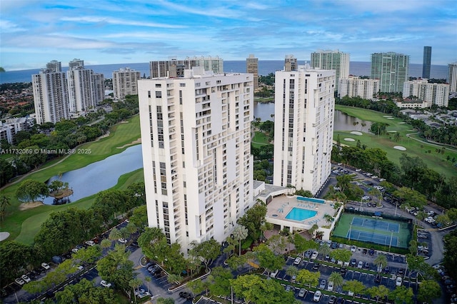 birds eye view of property featuring a water view