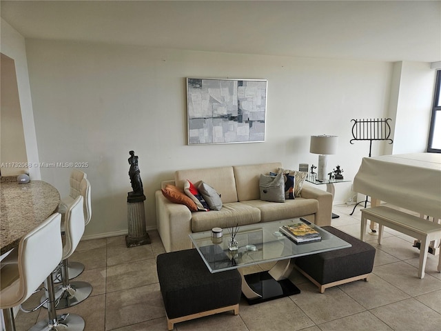 living room with light tile patterned floors