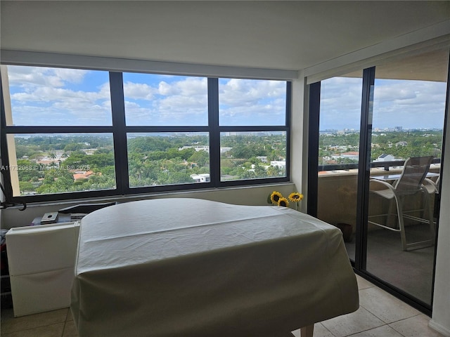 bedroom featuring light tile patterned flooring