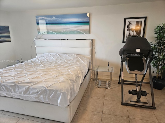 bedroom featuring light tile patterned floors