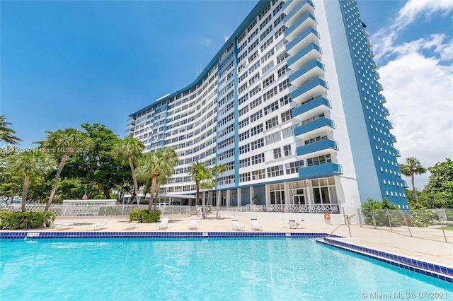 view of pool featuring a patio