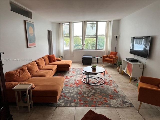 living room featuring light tile patterned floors