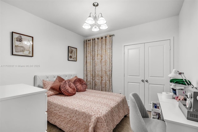 bedroom featuring dark colored carpet and an inviting chandelier