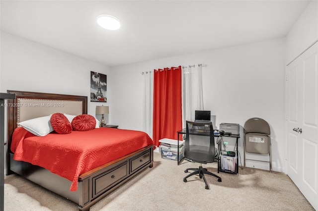 bedroom with light carpet