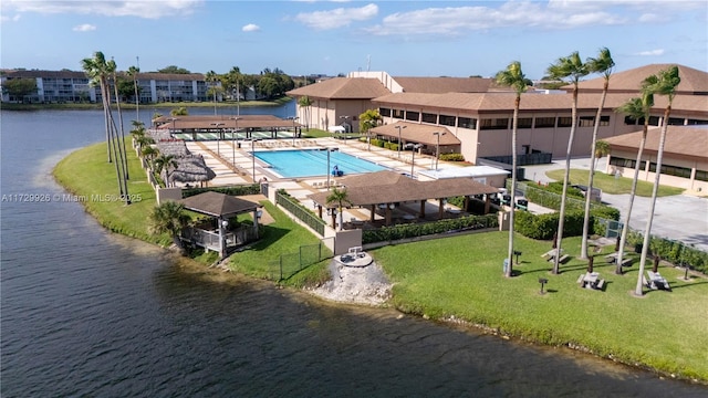 view of pool featuring a gazebo, a water view, and a yard