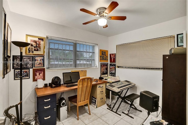 office space with ceiling fan and tile patterned floors