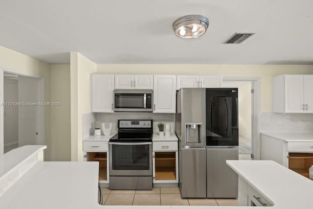 kitchen featuring white cabinetry, visible vents, appliances with stainless steel finishes, and light countertops