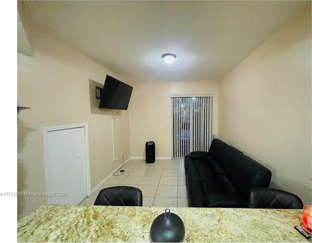 living room with light tile patterned floors