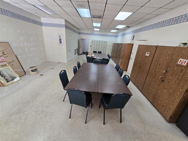 dining room featuring a paneled ceiling