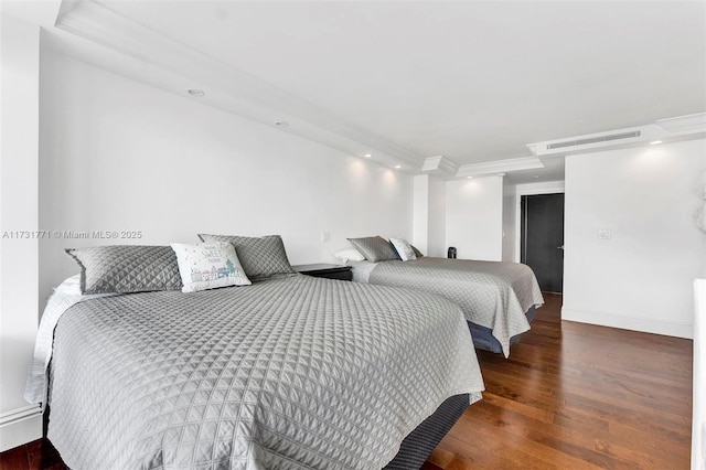 bedroom featuring dark hardwood / wood-style floors