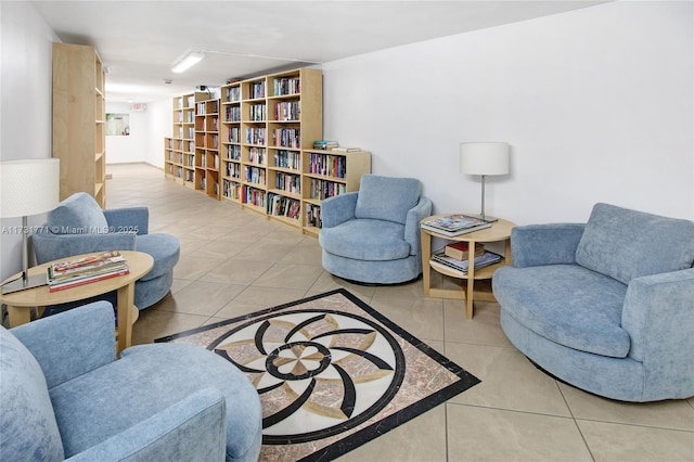 living area featuring light tile patterned flooring