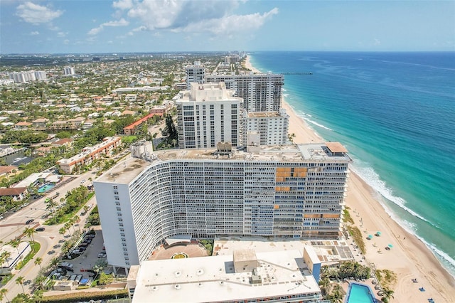 drone / aerial view with a view of the beach and a water view