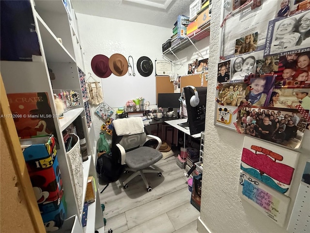 office area featuring a textured ceiling