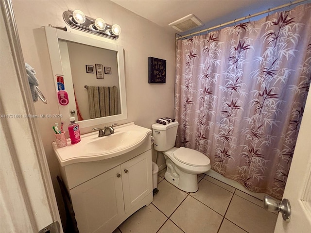 bathroom featuring vanity, tile patterned floors, toilet, and a shower with shower curtain