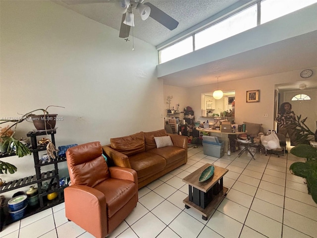 tiled living room with a textured ceiling