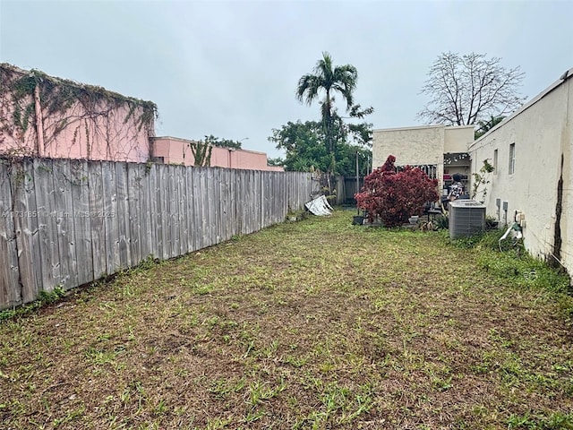 view of yard with central AC unit