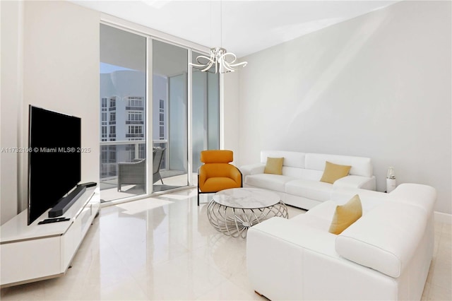 living room featuring a wall of windows and a chandelier