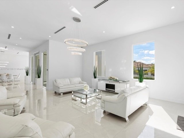 living room with a notable chandelier