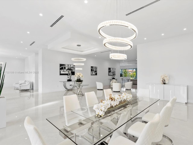 dining room with a chandelier