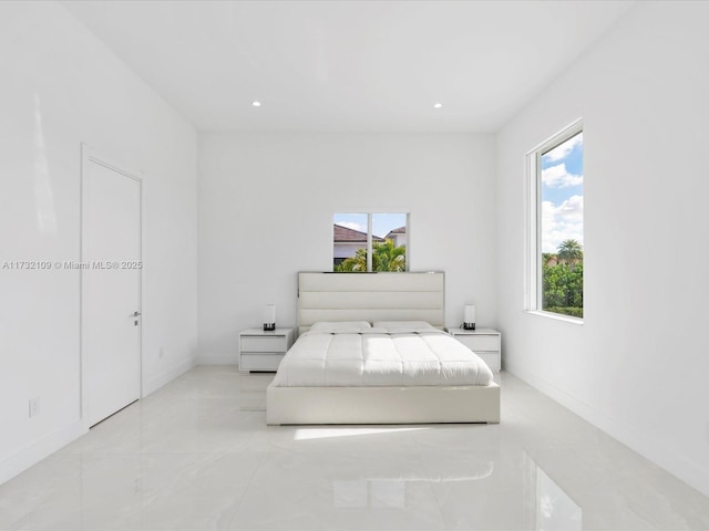 unfurnished bedroom featuring light tile patterned floors