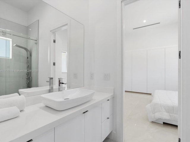 bathroom featuring vanity and walk in shower