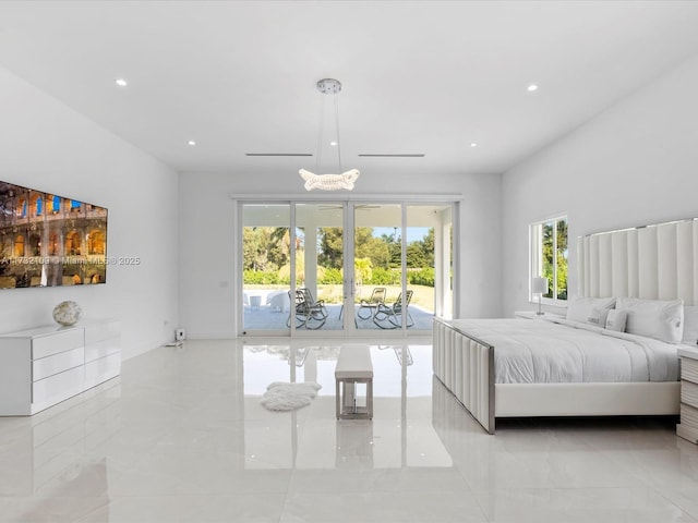 bedroom featuring access to exterior and french doors