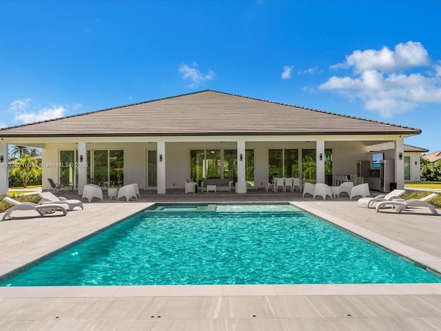 view of pool with a patio area