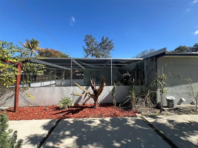 exterior space featuring a lanai and a patio