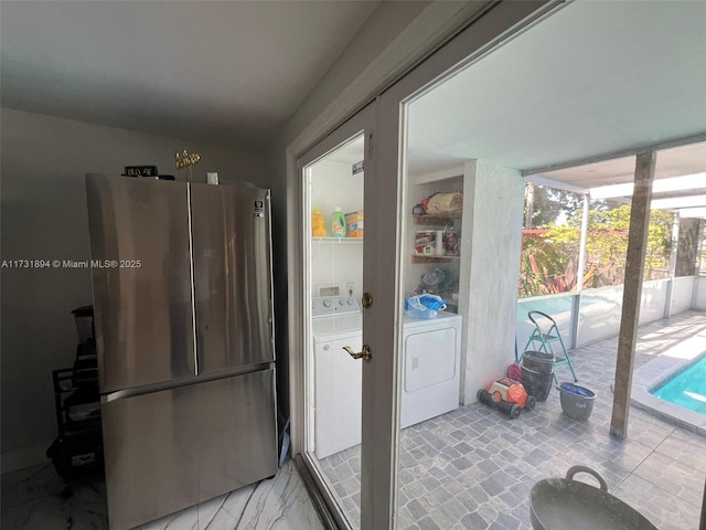 interior space featuring washer and clothes dryer