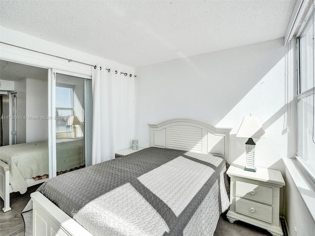 bedroom with a textured ceiling