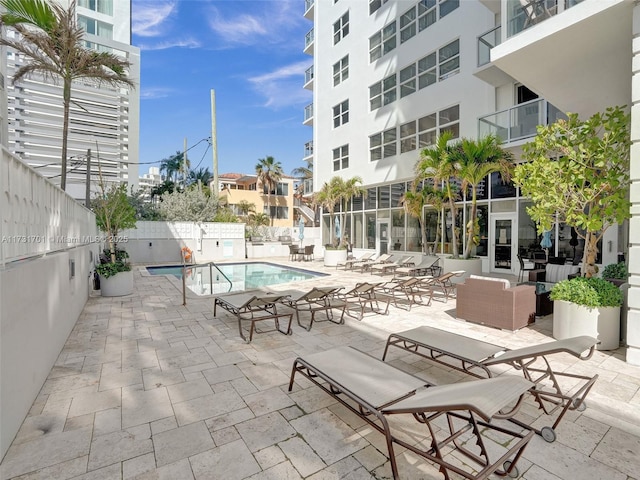 view of pool with a patio area