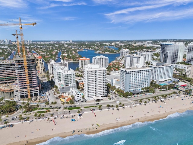 aerial view featuring a water view and a view of the beach