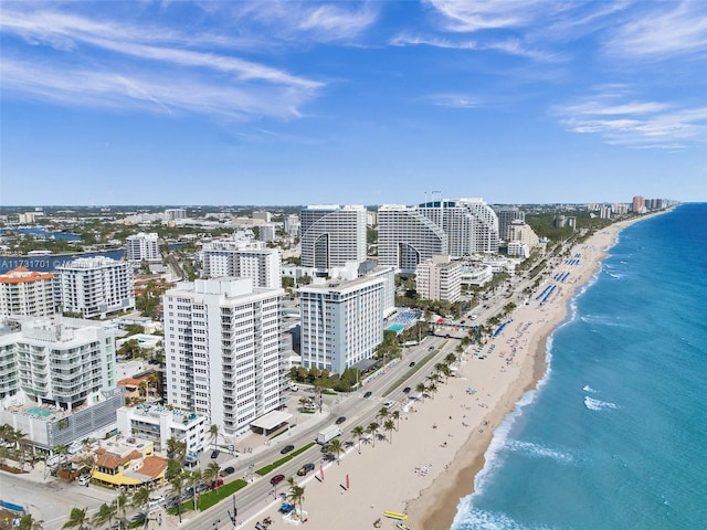 drone / aerial view featuring a view of the beach and a water view