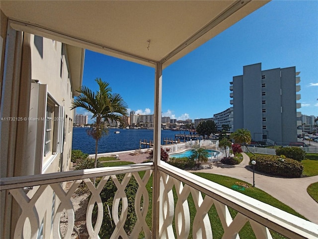 balcony featuring a water view