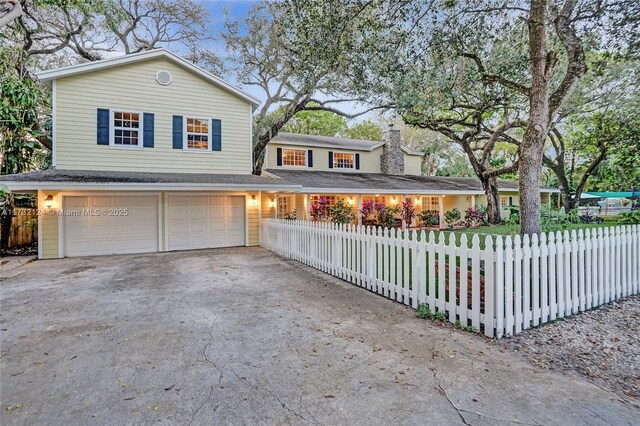 view of property with a garage