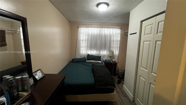 bedroom featuring hardwood / wood-style flooring