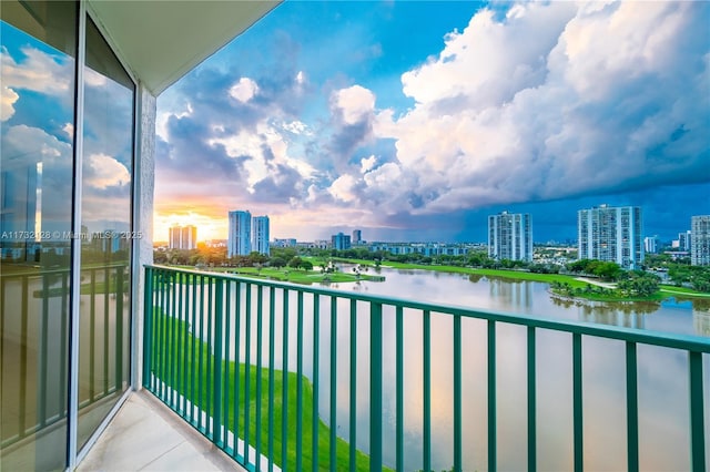 balcony at dusk with a water view