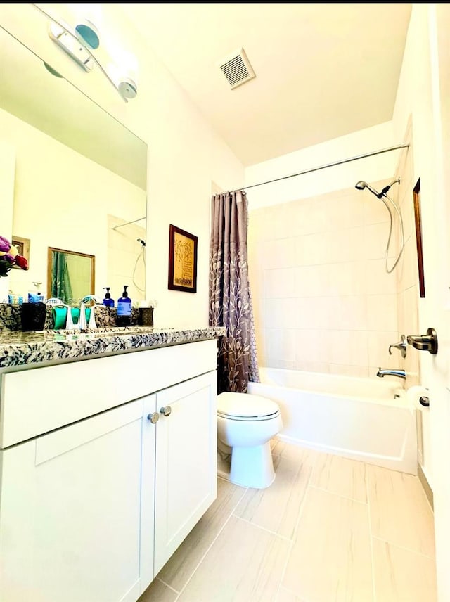 full bathroom with vanity, tile patterned flooring, shower / bath combination with curtain, and toilet