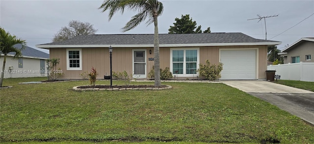 ranch-style house with a garage and a front yard