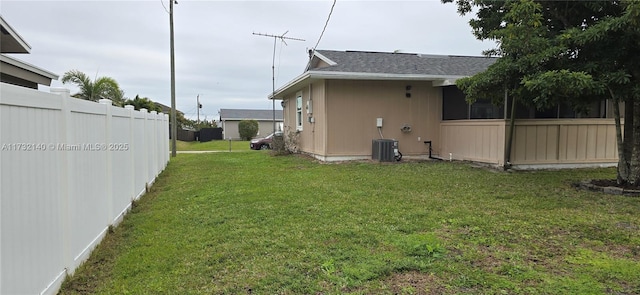 view of yard featuring central AC