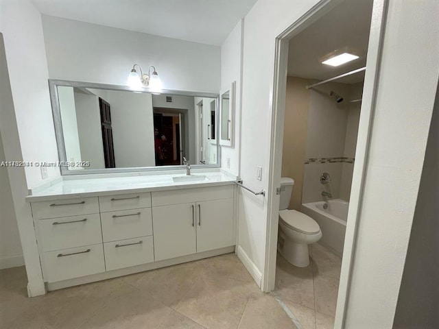 full bathroom featuring tiled shower / bath combo, vanity, tile patterned flooring, and toilet