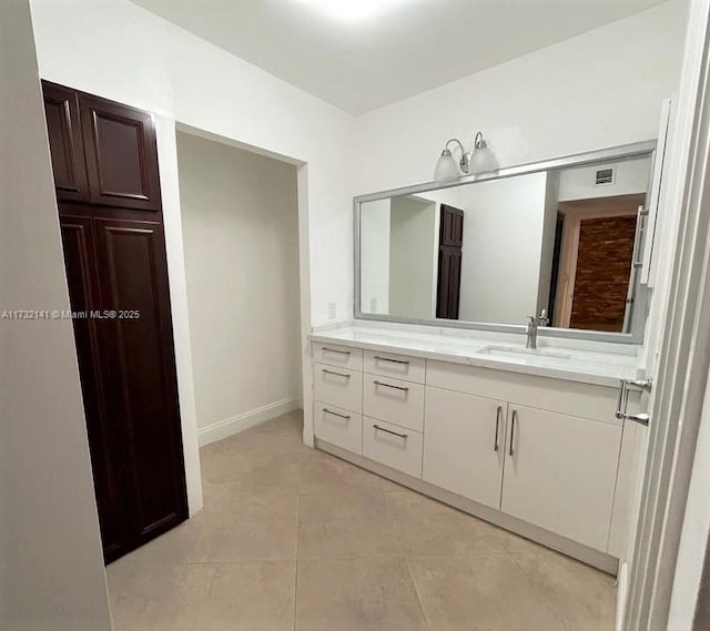 bathroom featuring vanity and tile patterned floors