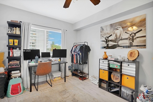 office area featuring hardwood / wood-style floors and ceiling fan