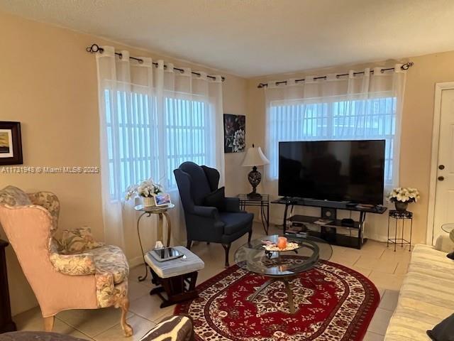 living room featuring tile patterned flooring