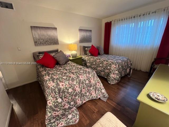 bedroom featuring hardwood / wood-style floors