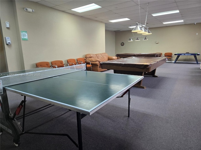 recreation room with a drop ceiling