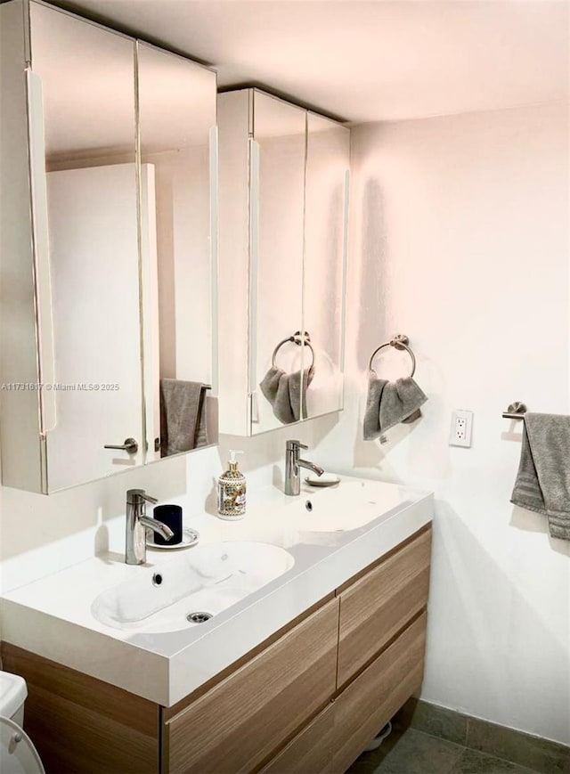 bathroom featuring vanity and tile patterned flooring