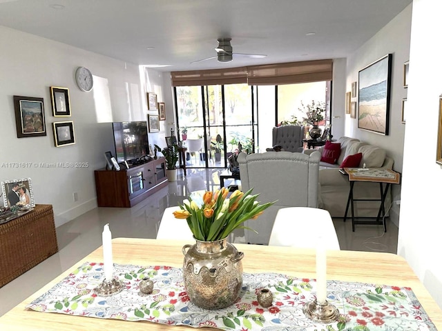 dining room featuring ceiling fan